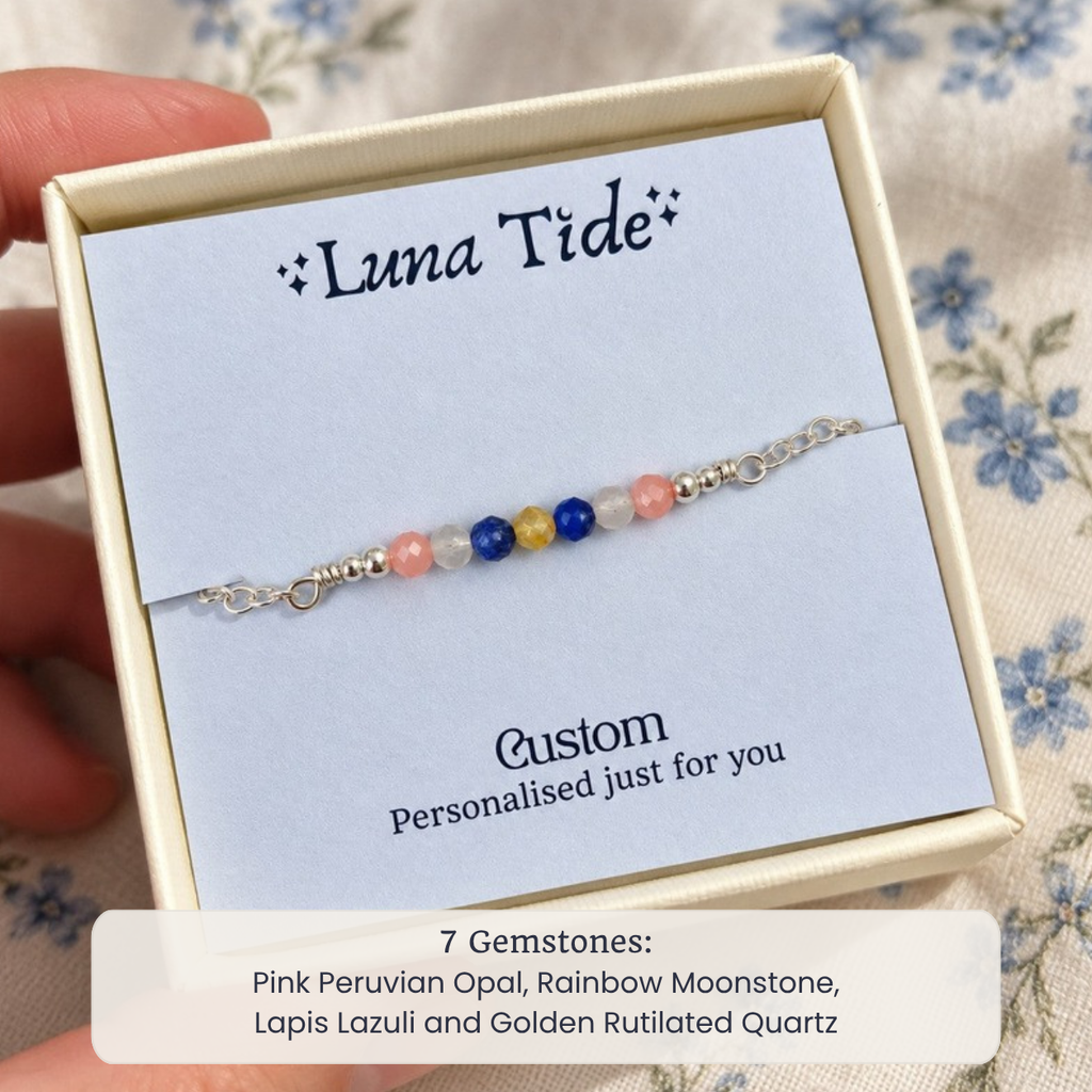 Custom faceted bead bar bracelet with Pink Peruvian Opal, Rainbow Moonstone, Lapis Lazuli and Golden Rutilated Quartz in a Luna Tide gift box